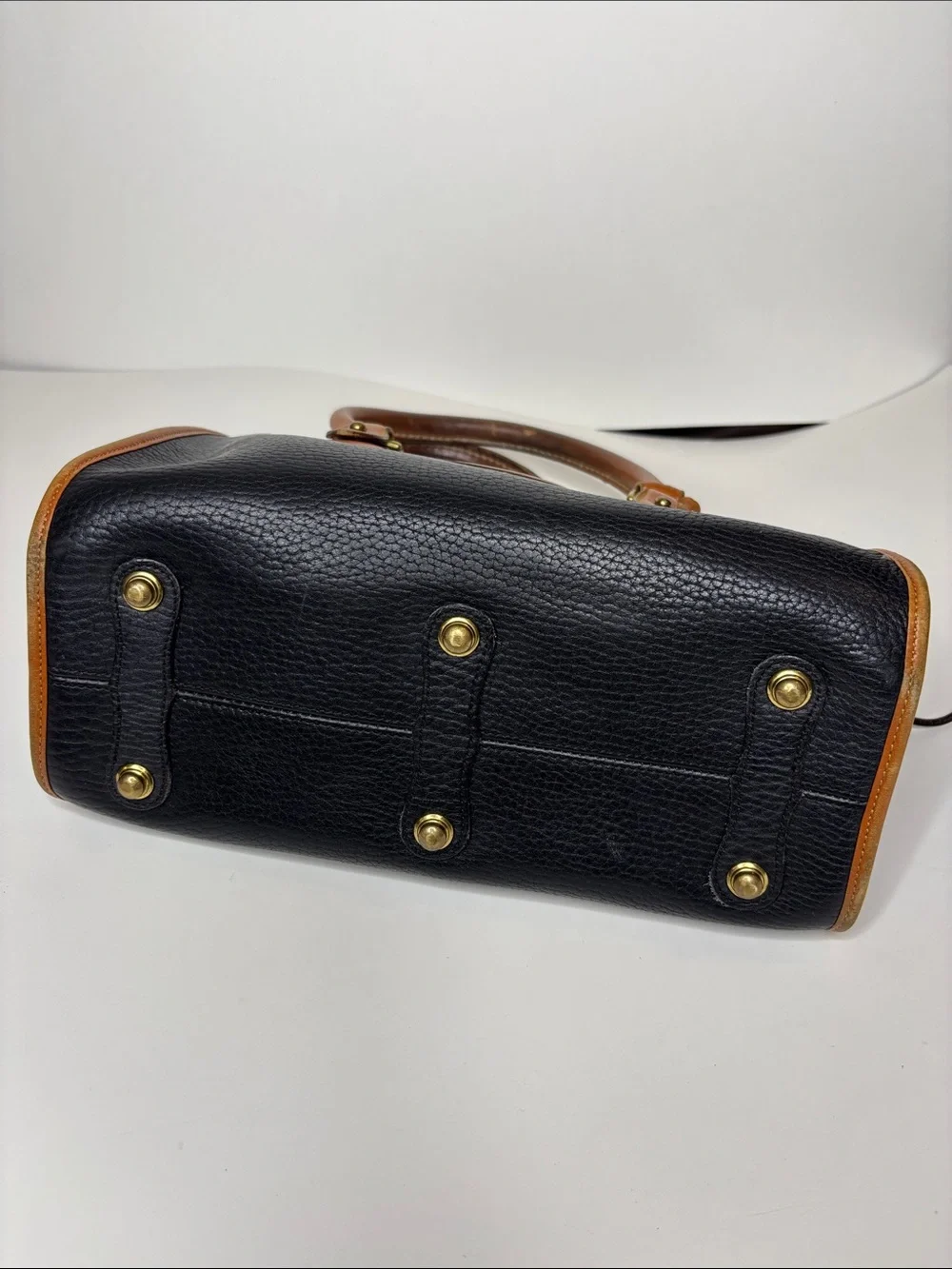 Dooney & Bourke Black Pebbled Leather Satchel with Tan Trim